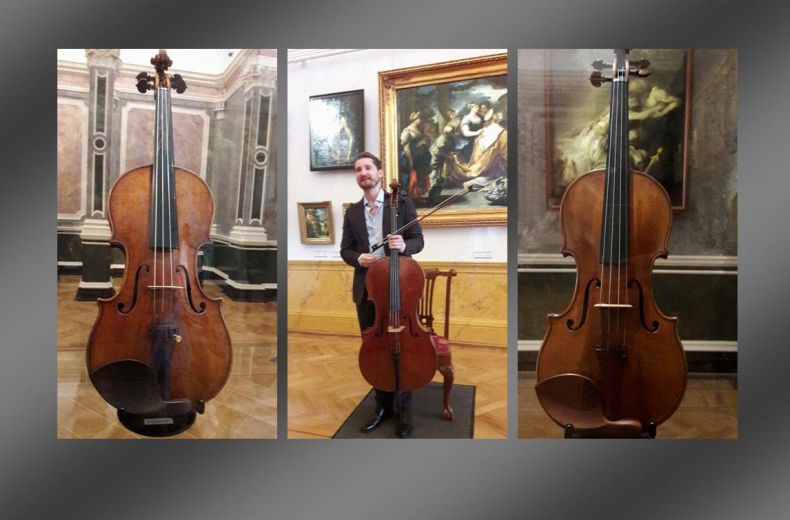 Instruments from the exhibition flanking Max Beitan with the Archinto cello